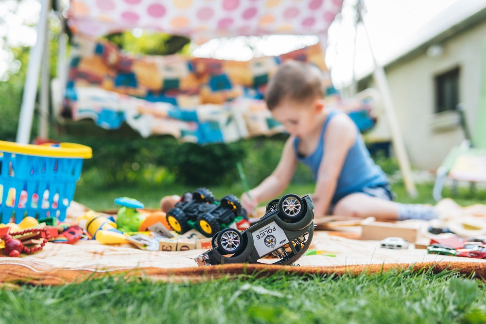 baby playing with toddler toys