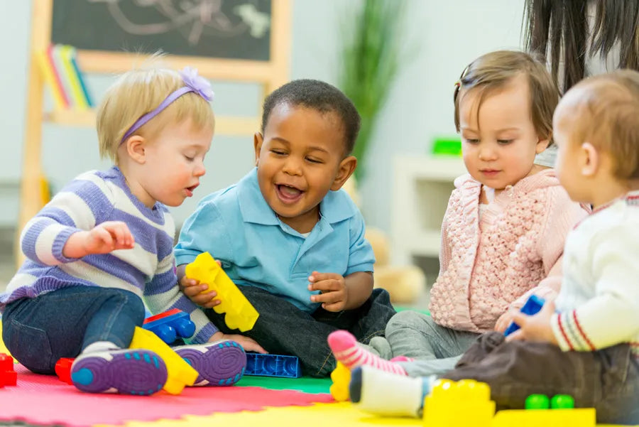 Toddlers playing with toys