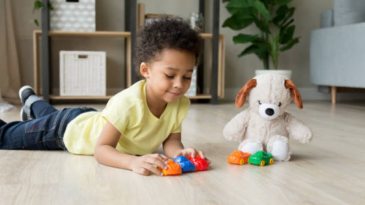 Child Playing With Plush Toys