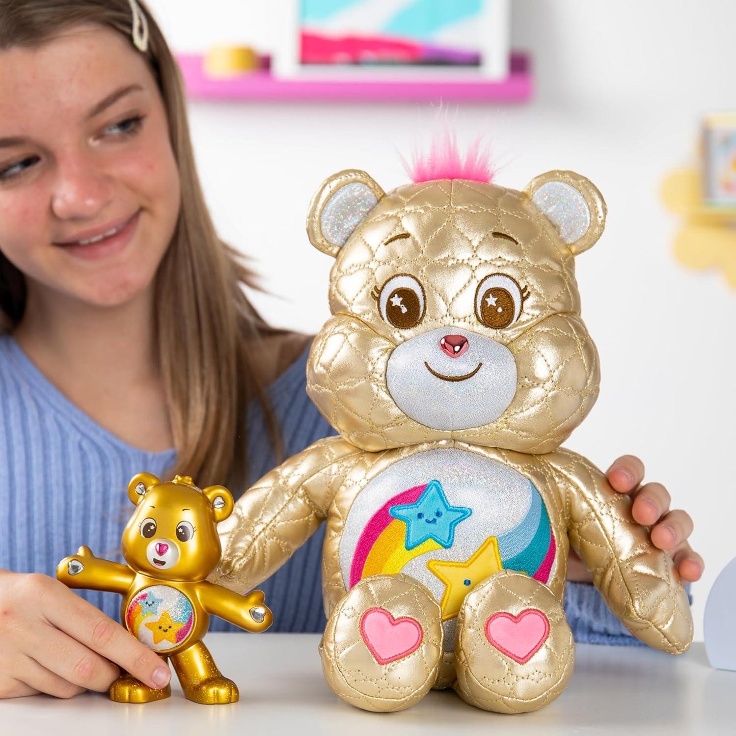 Child cuddling care bear