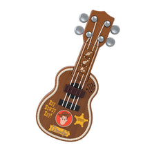 Fisher-Price Toy Story Woody's Guitar — child playing the guitar in pretend cowboy play