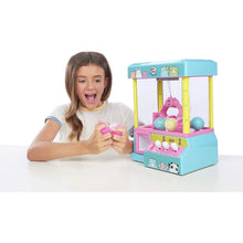 Child enjoying the moj moj claw machine
