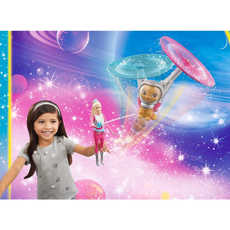 Child playing with Barbie Star Light Galaxy Barbie Doll & Flying Cat