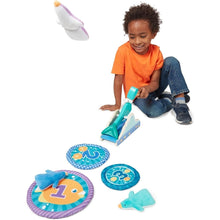 Child playing with Melissa and Doug Fun At the Fair Penguin Launch Activity Toy